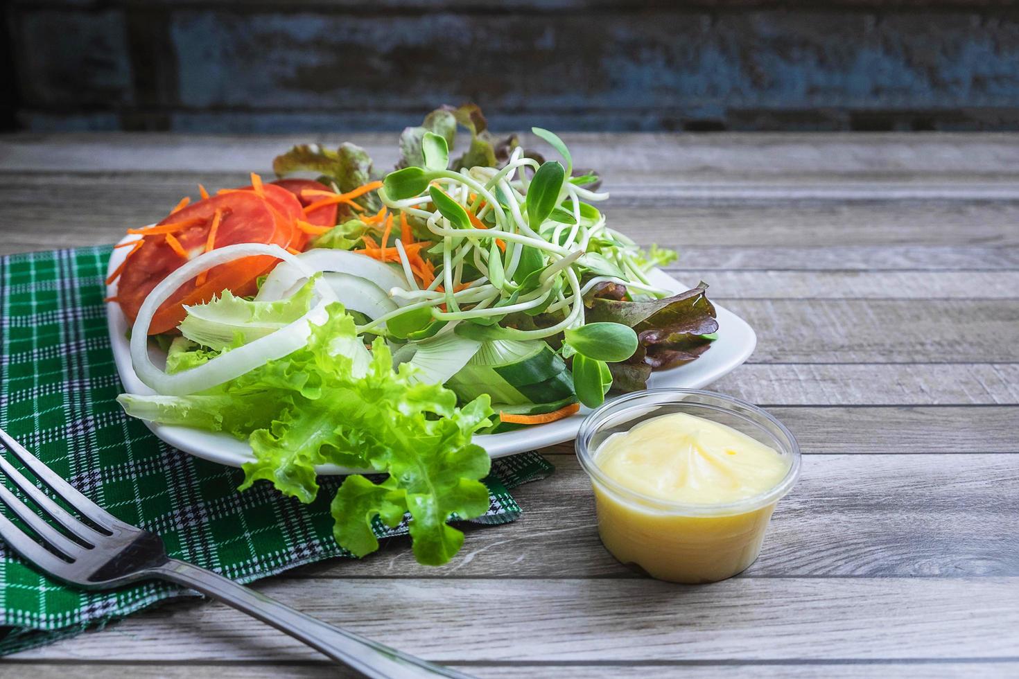 Plate of salad on a table photo