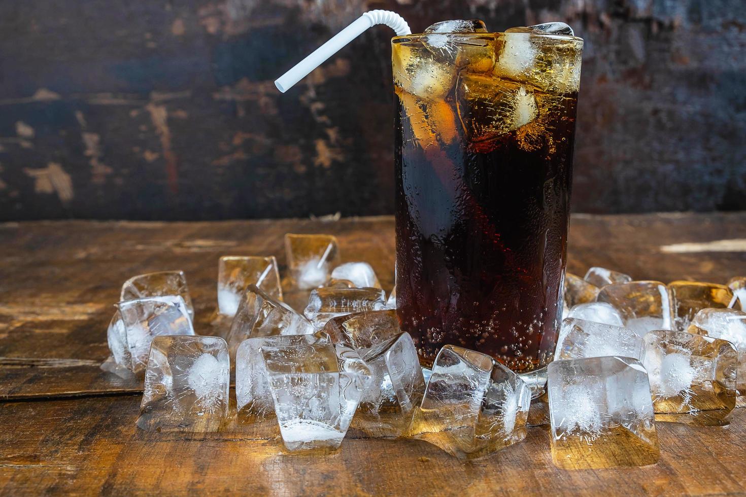 Iced cola on a table photo