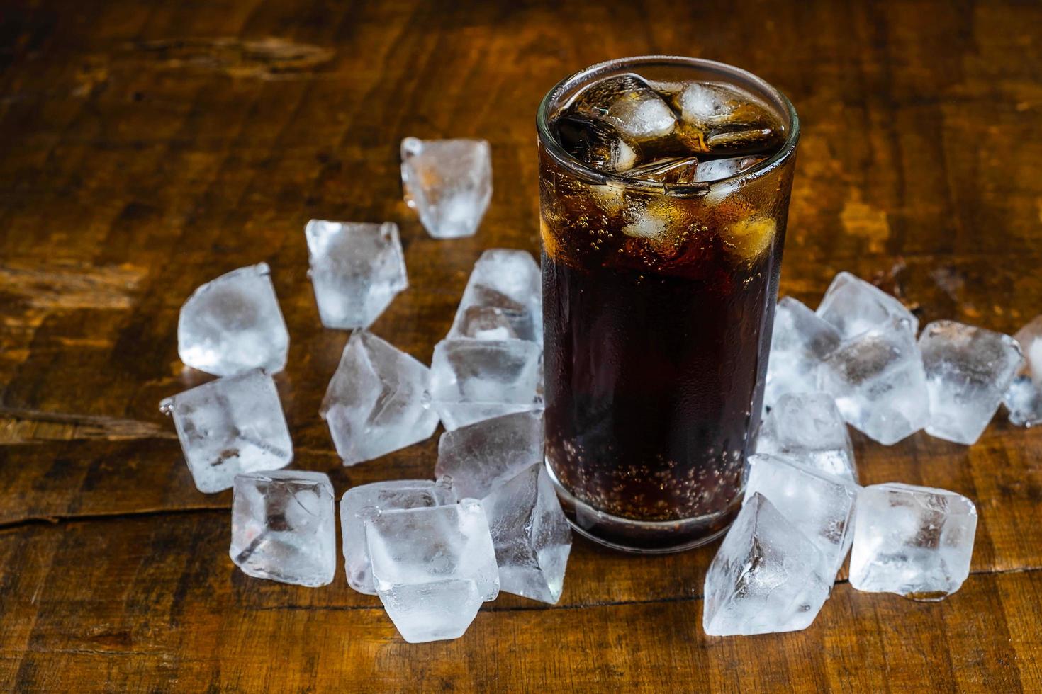 Cola surrounded with ice photo