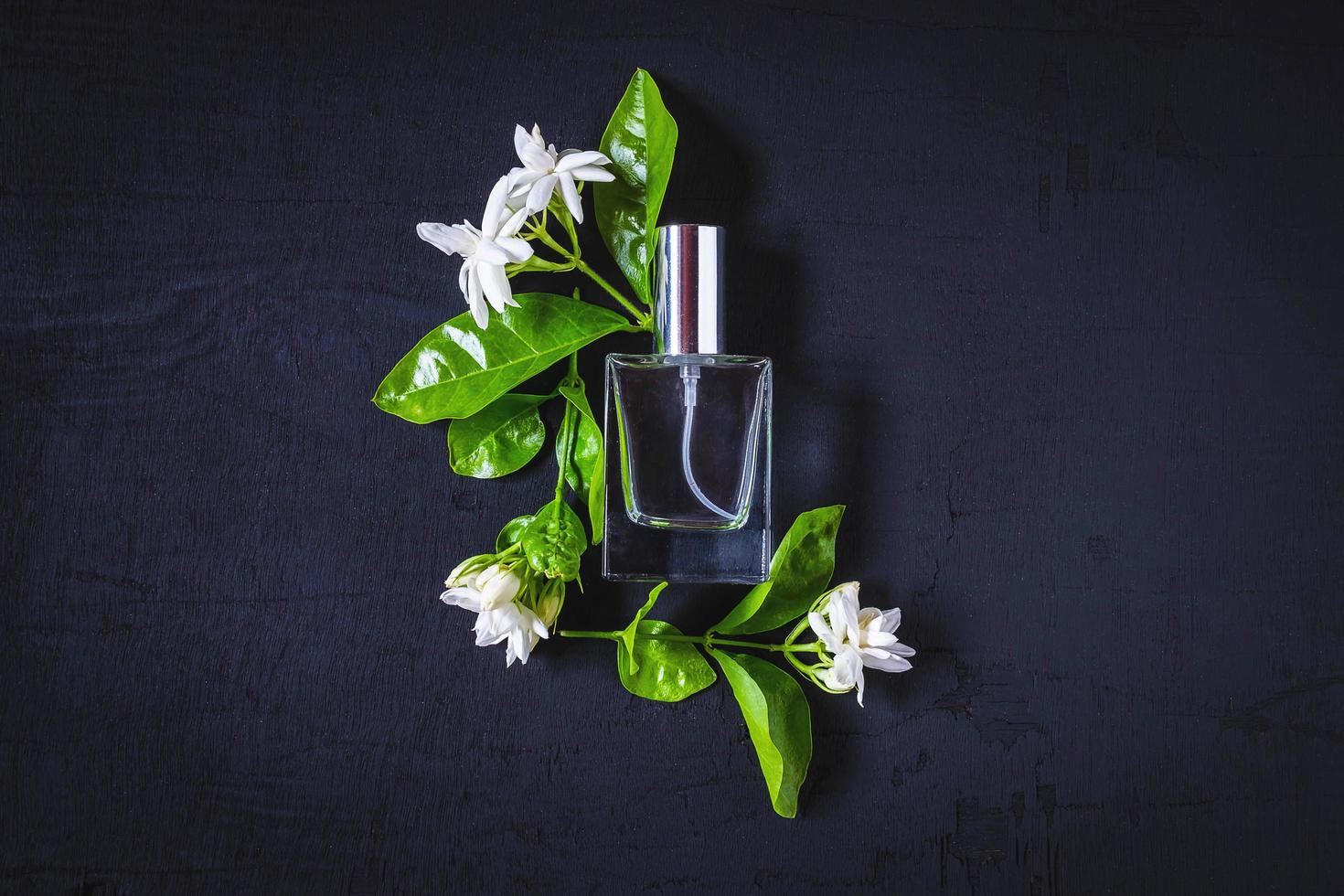 Perfume and flowers photo