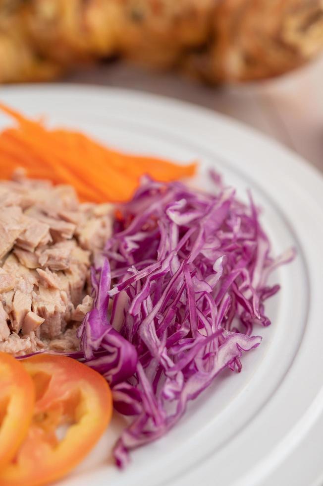 Tuna salad with carrots, tomatoes and cabbage 1852858 Stock Photo at Vecteezy
