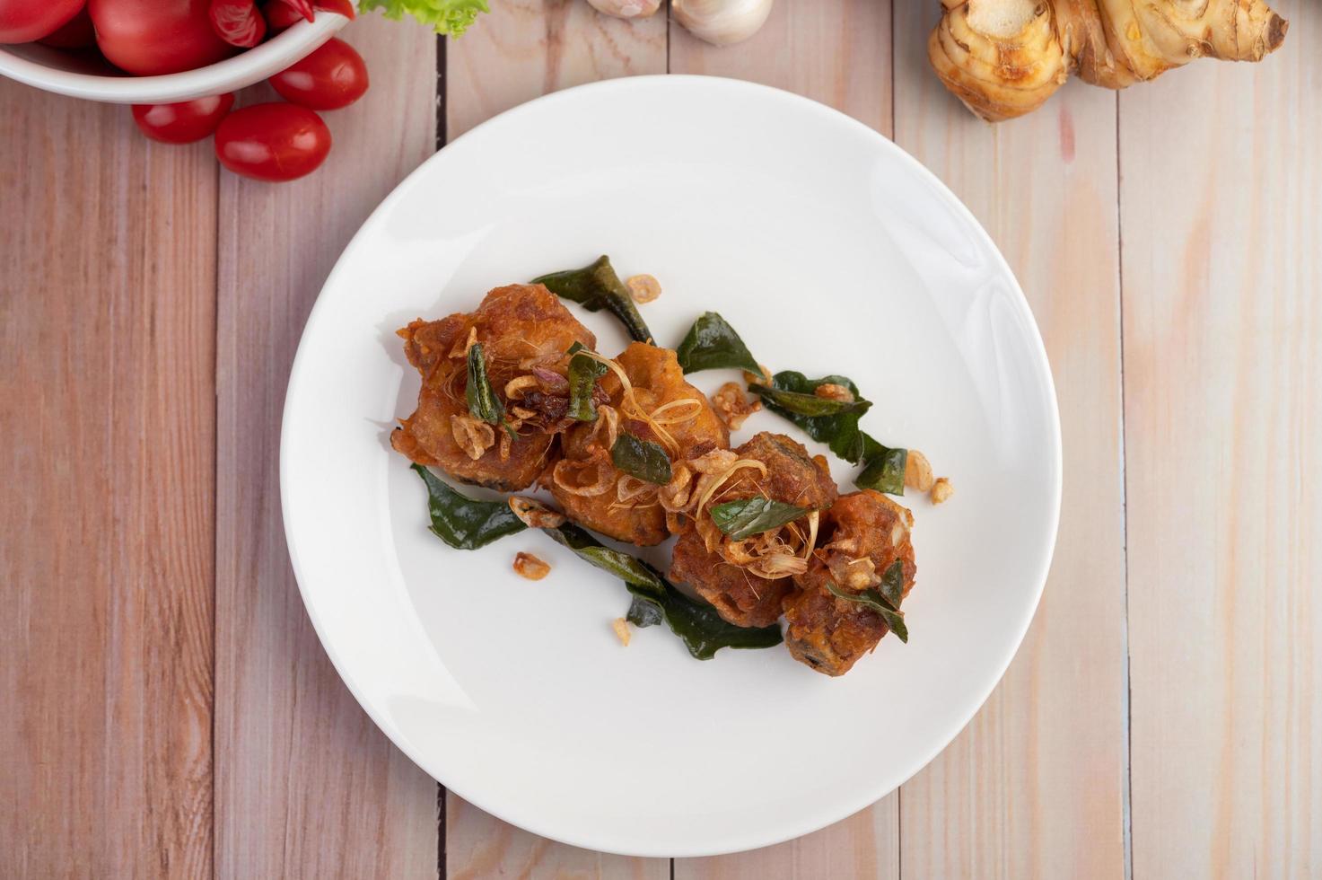 A plate of herb fried chicken photo