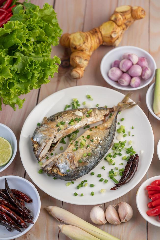 A plate of cooked mackerel photo