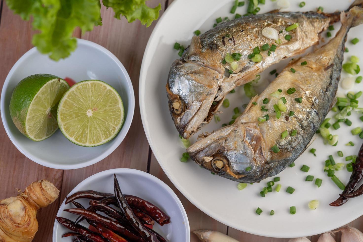 A plate of cooked mackerel photo