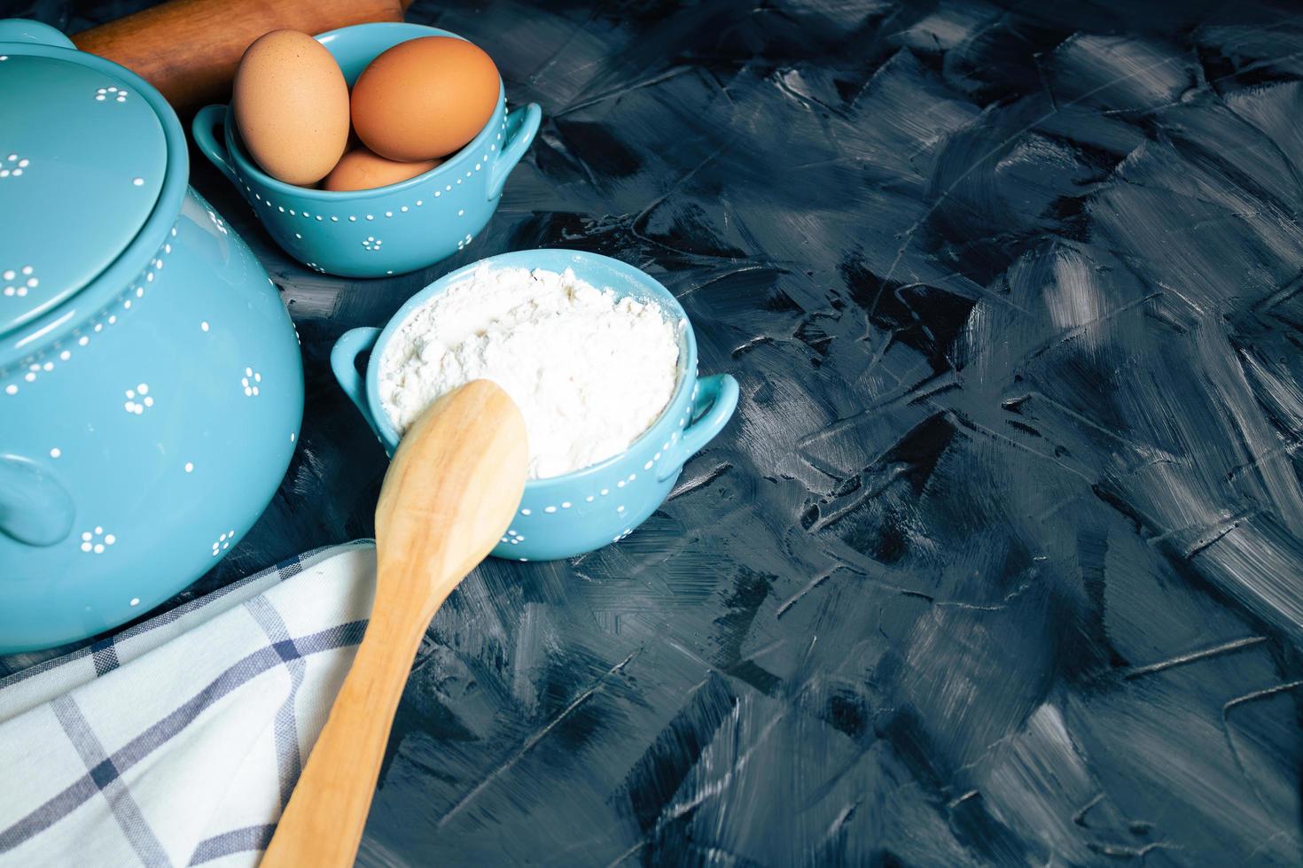 Wooden spoon and flour photo