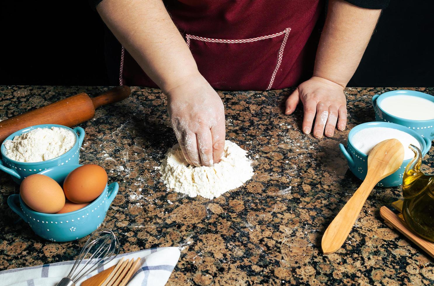Close-up of a person making pasta photo