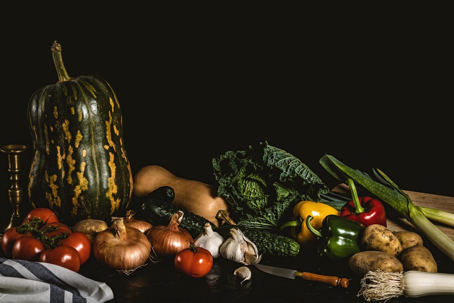 Still life of assorted vegetables and greens photo