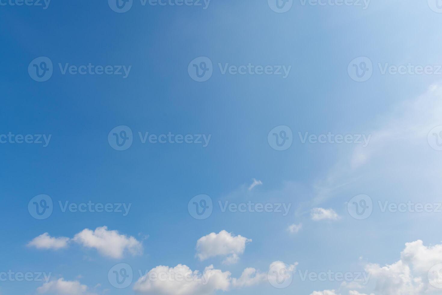 A man flying a kite in the sky photo