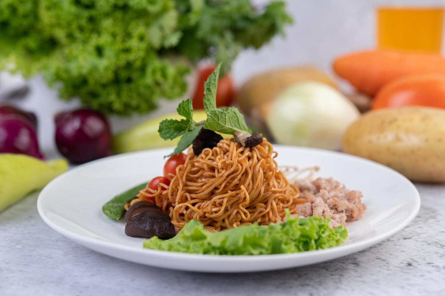 Stir-fried noodles with mixed vegetables photo