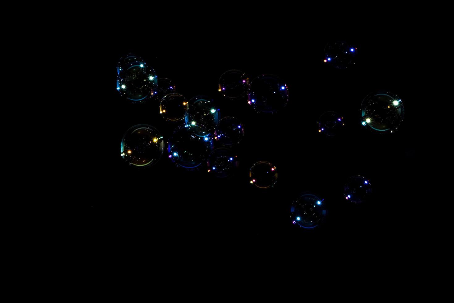 Bubbles on black background photo