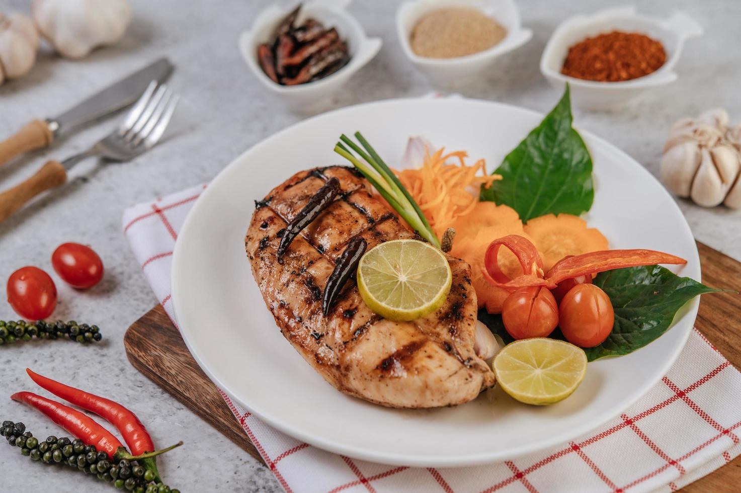 Chicken steak with vegetables photo