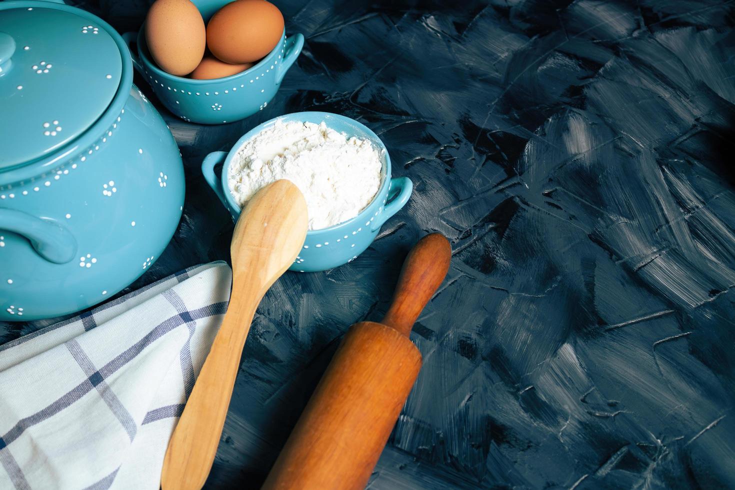 Baking ingredients on a gray background photo