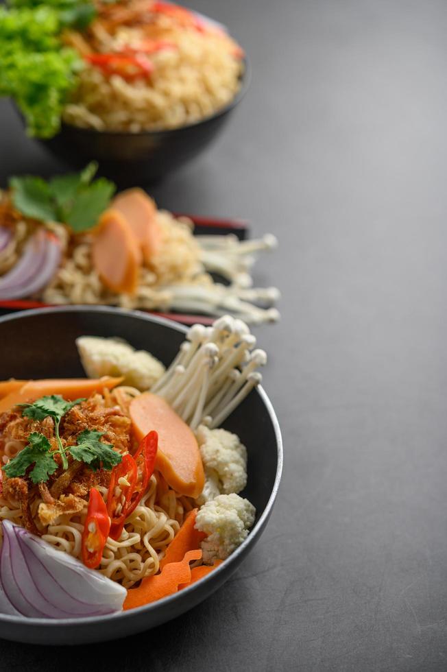 Spicy noodles in a frying pan photo