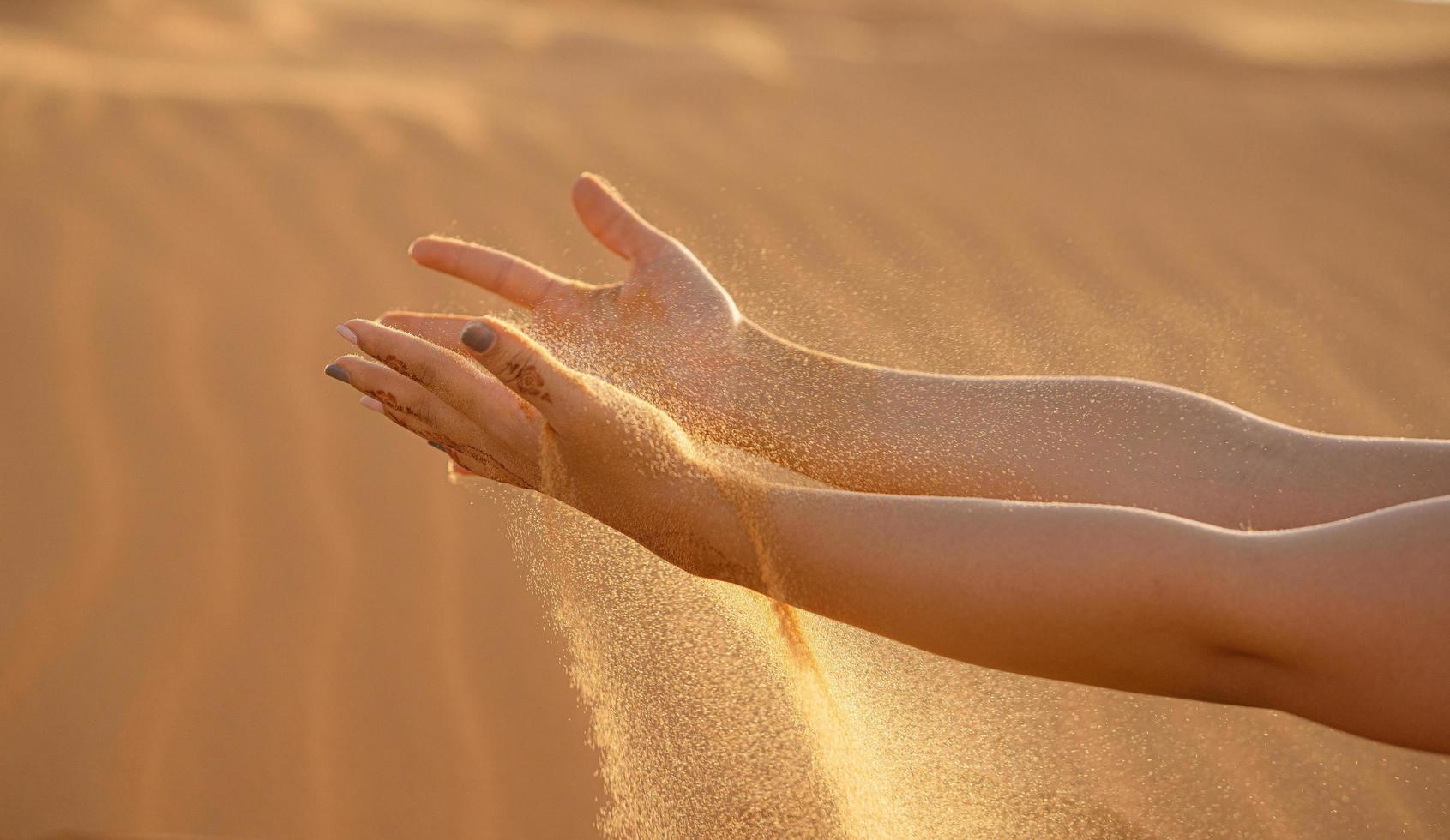 Arms and sand photo