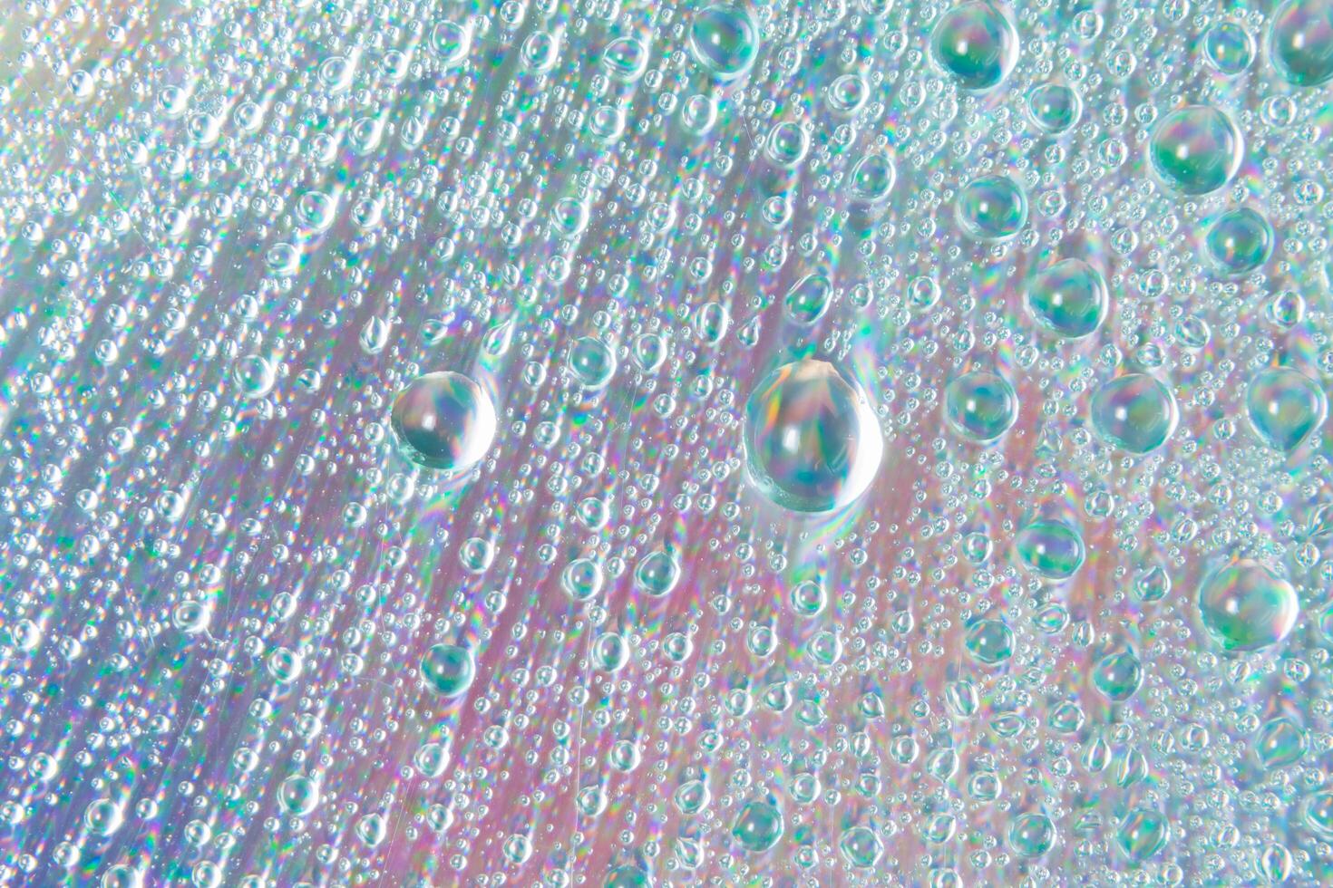 Macro background of colorful water drops photo