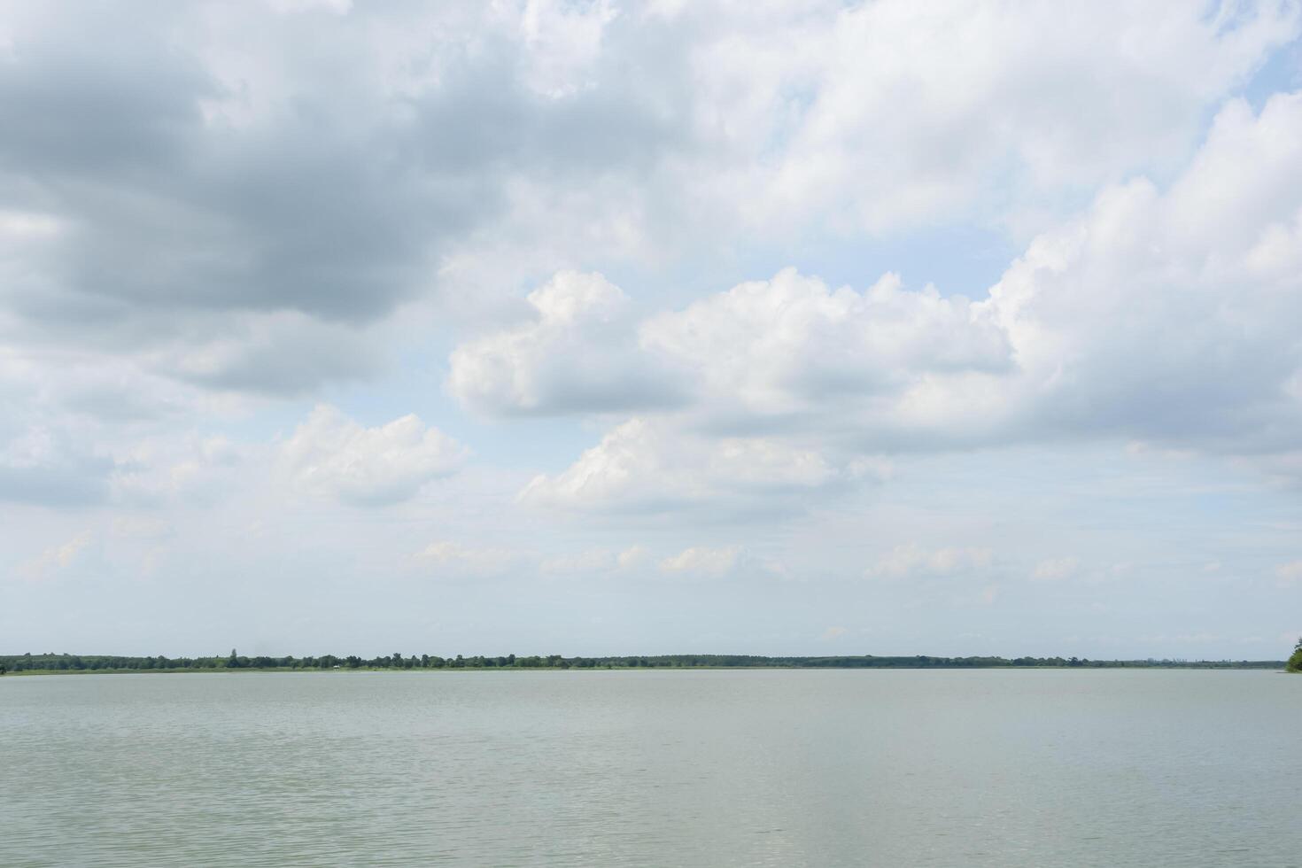 Lake under the cloudy sky photo