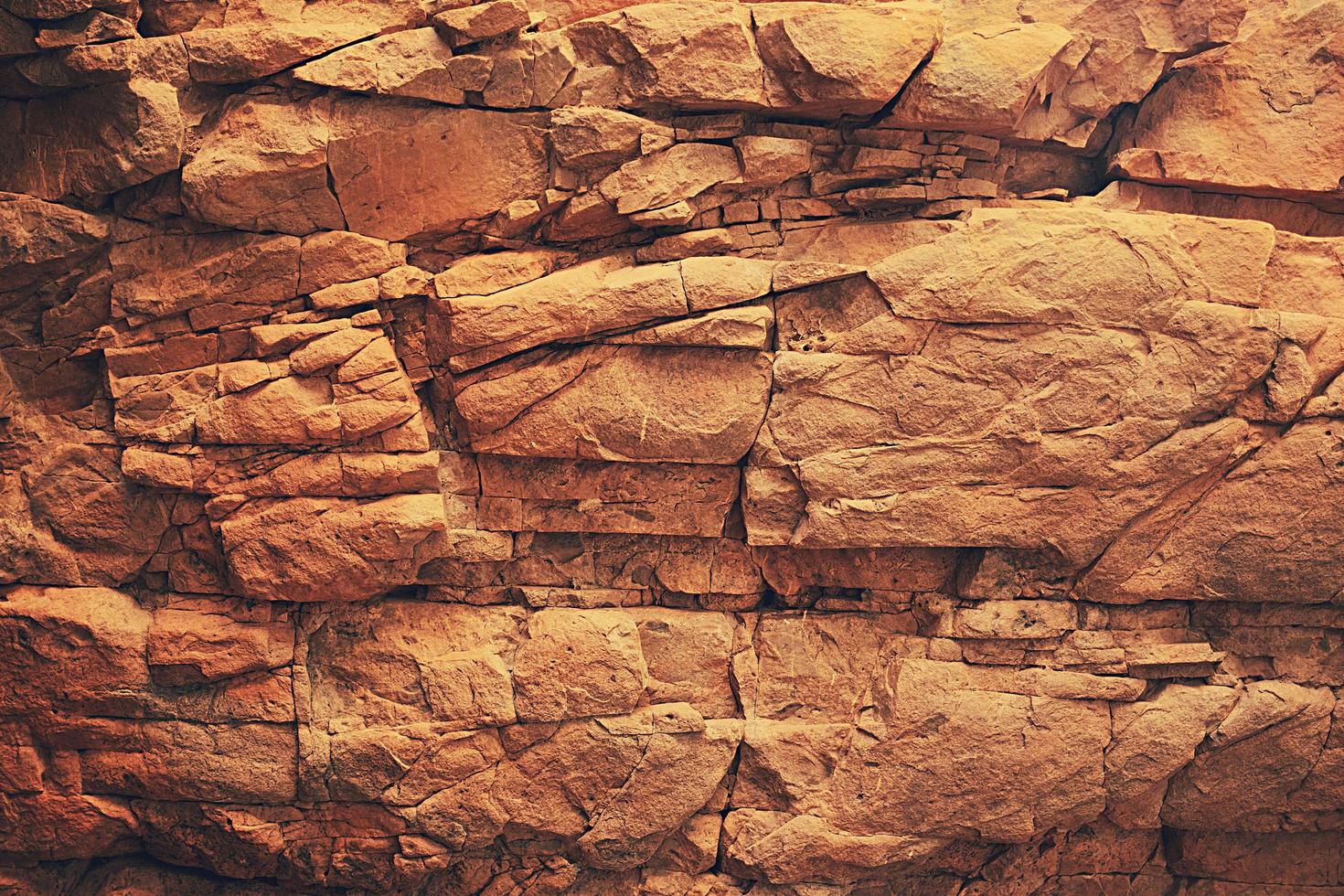 Brown rock wall photo