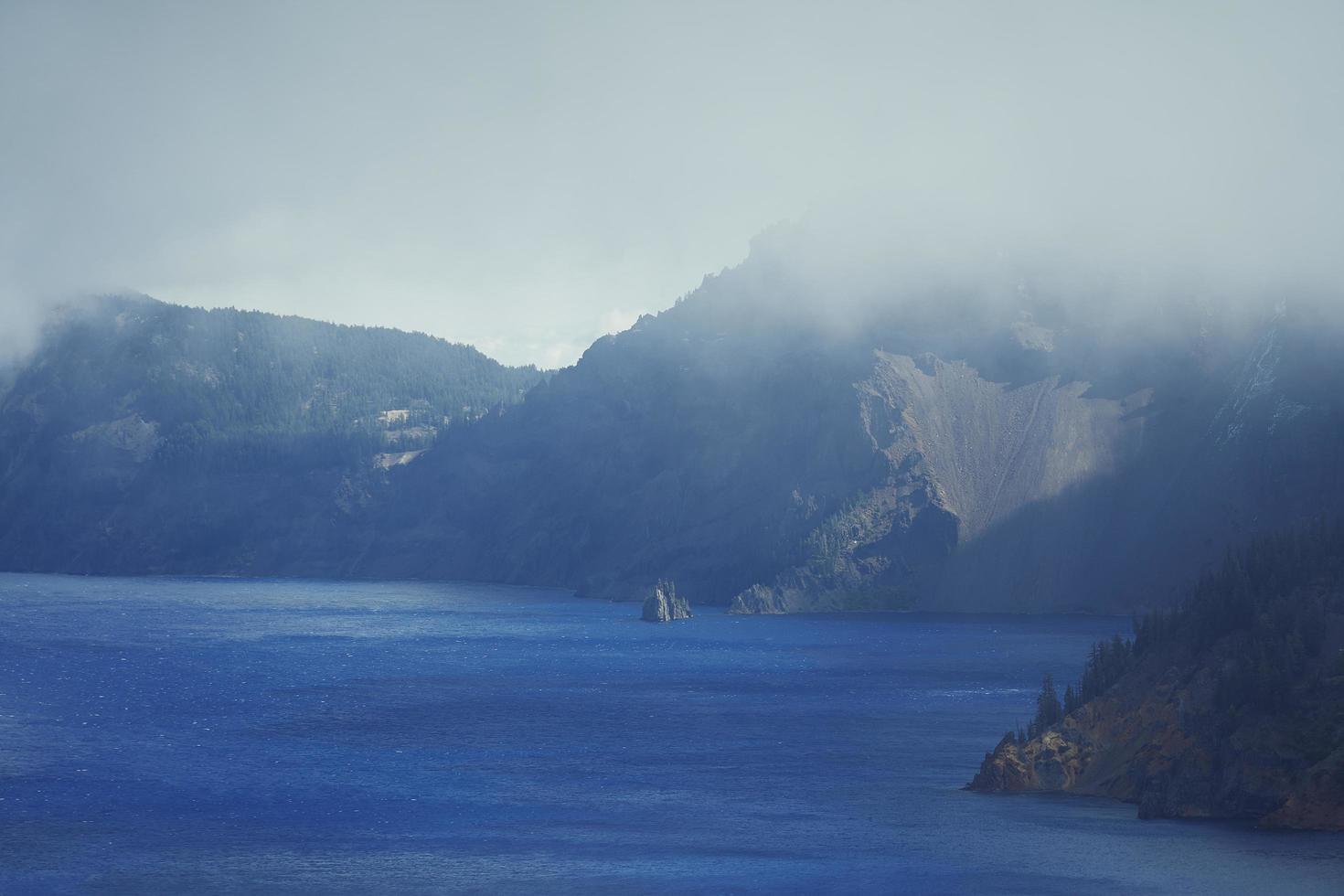 Mountains covered in fog photo