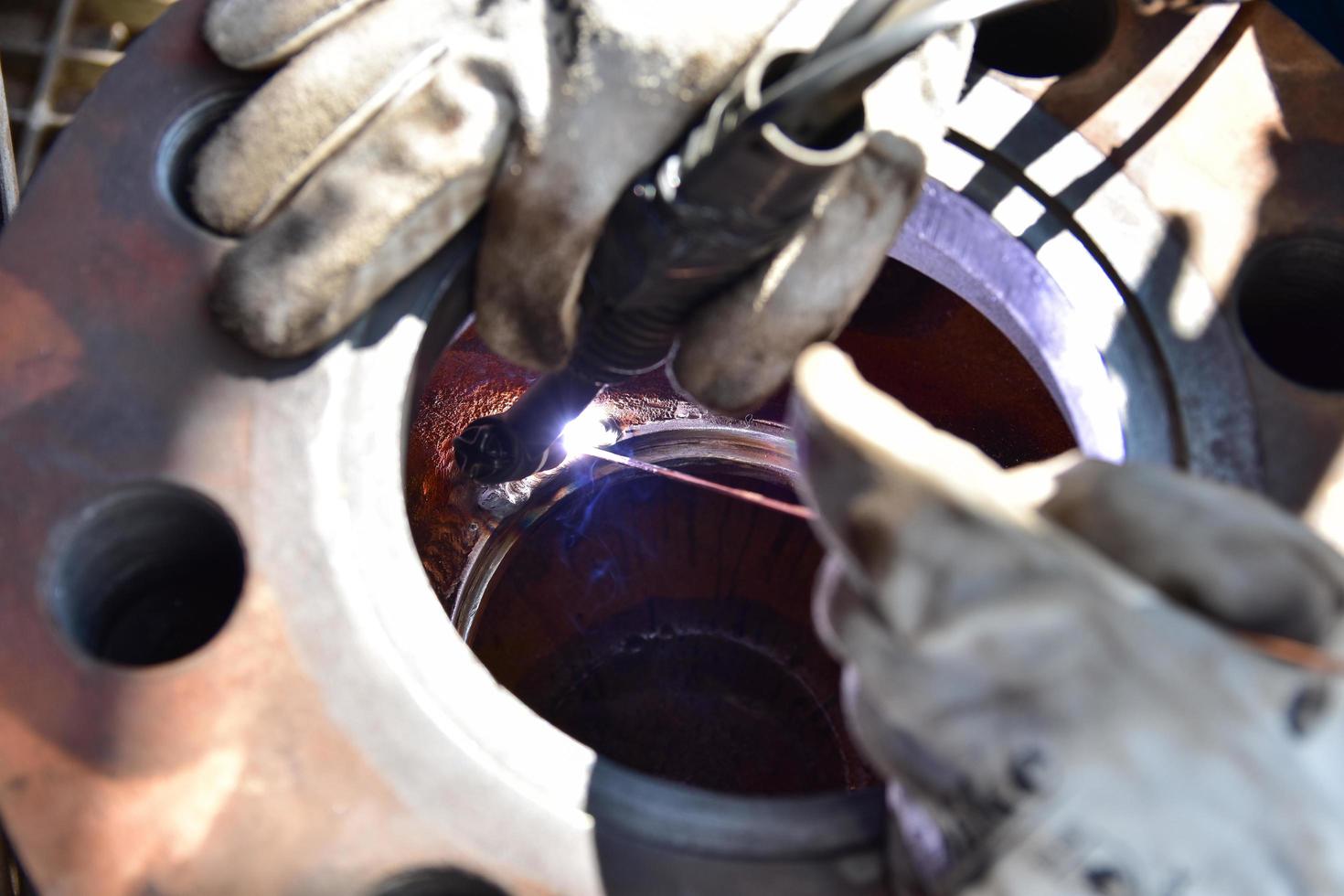 The welder repairing a valve photo