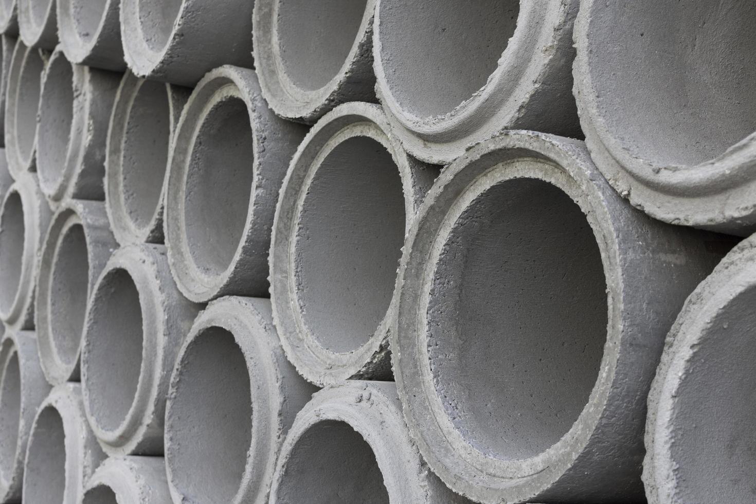 Cement pipes for construction water system. photo