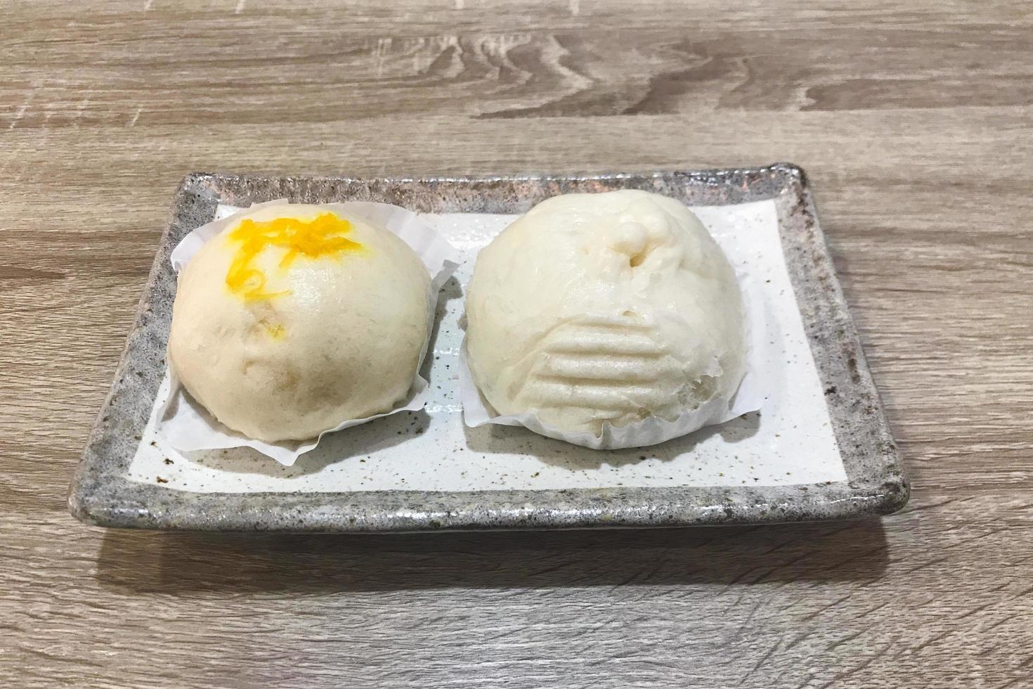 Steamed buns on a tray photo