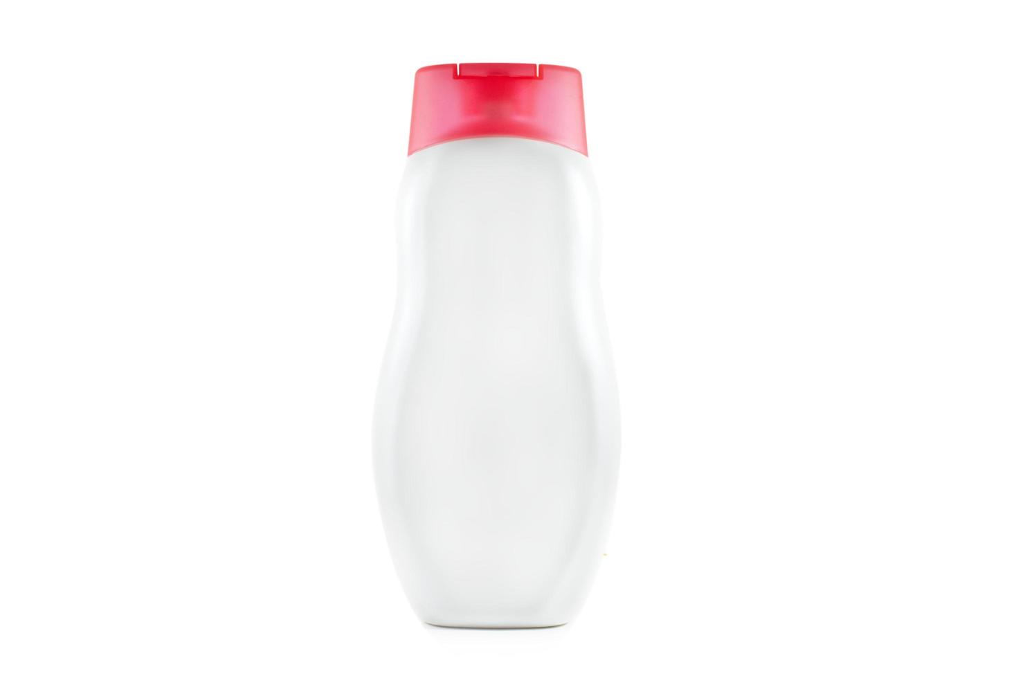 Botella de placa para envases de jabón líquido fondo blanco aislado. foto