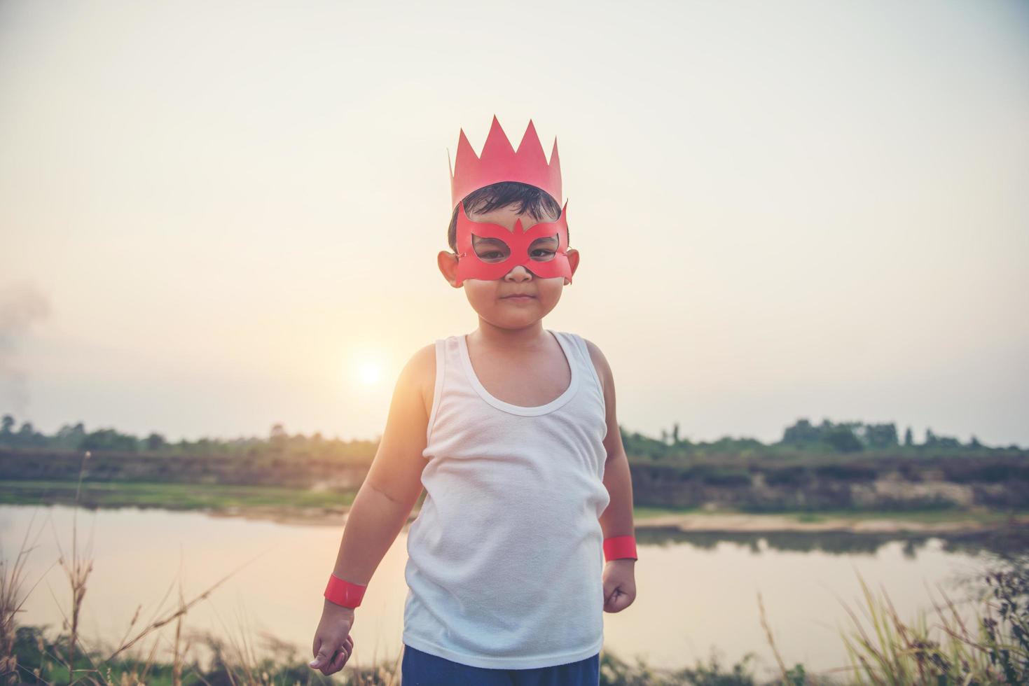 Super boy showing his powerful flying arms photo