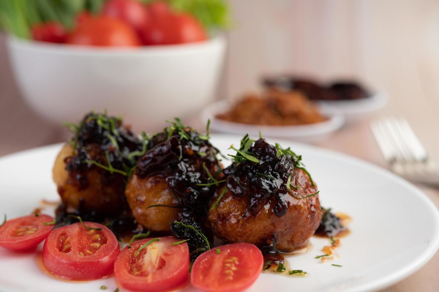 Boiled eggs stir-fried with tamarind sauce photo