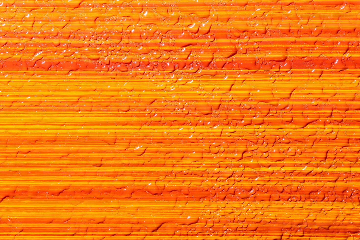 Wet orange stripes background photo