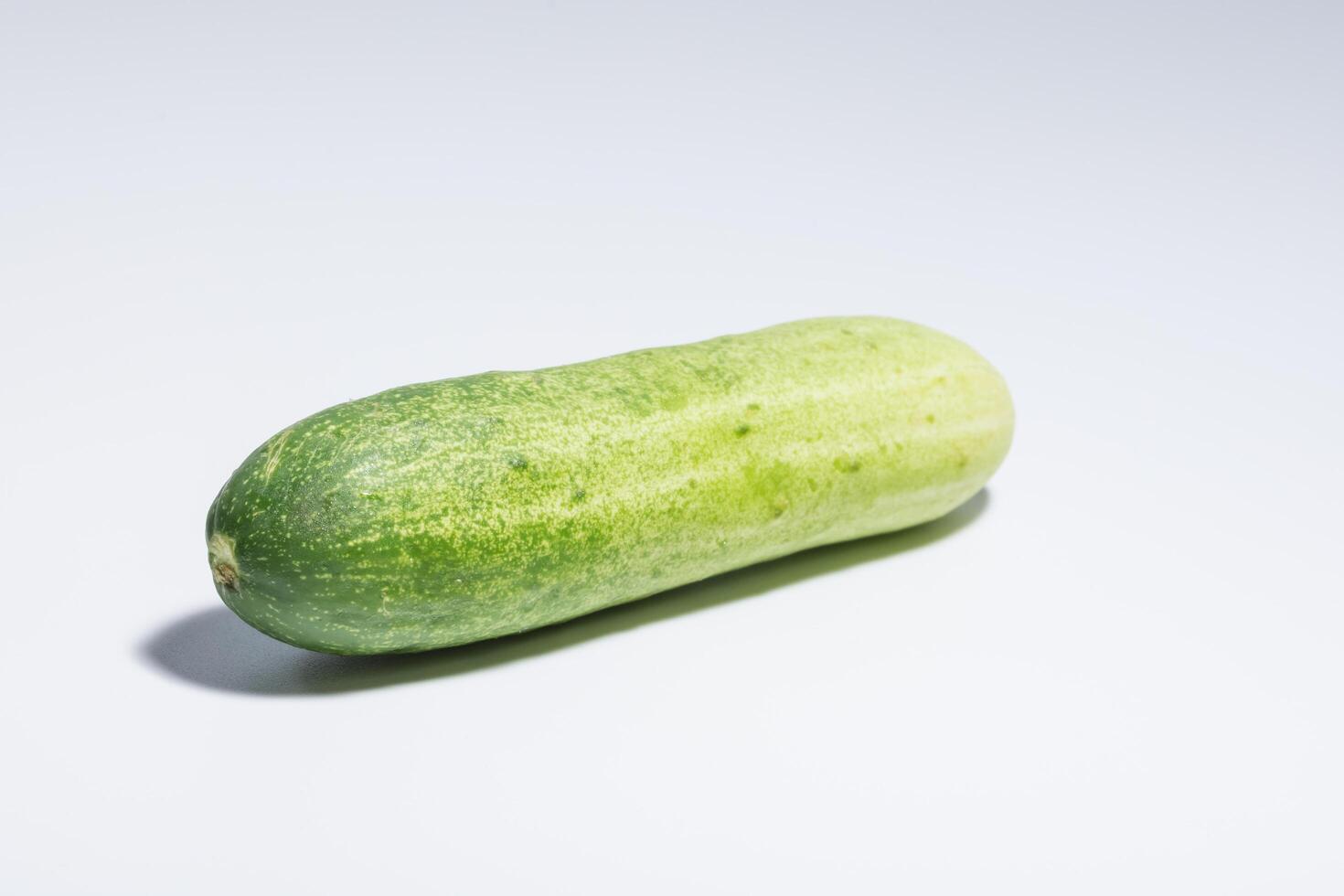 Cucumber on white background photo