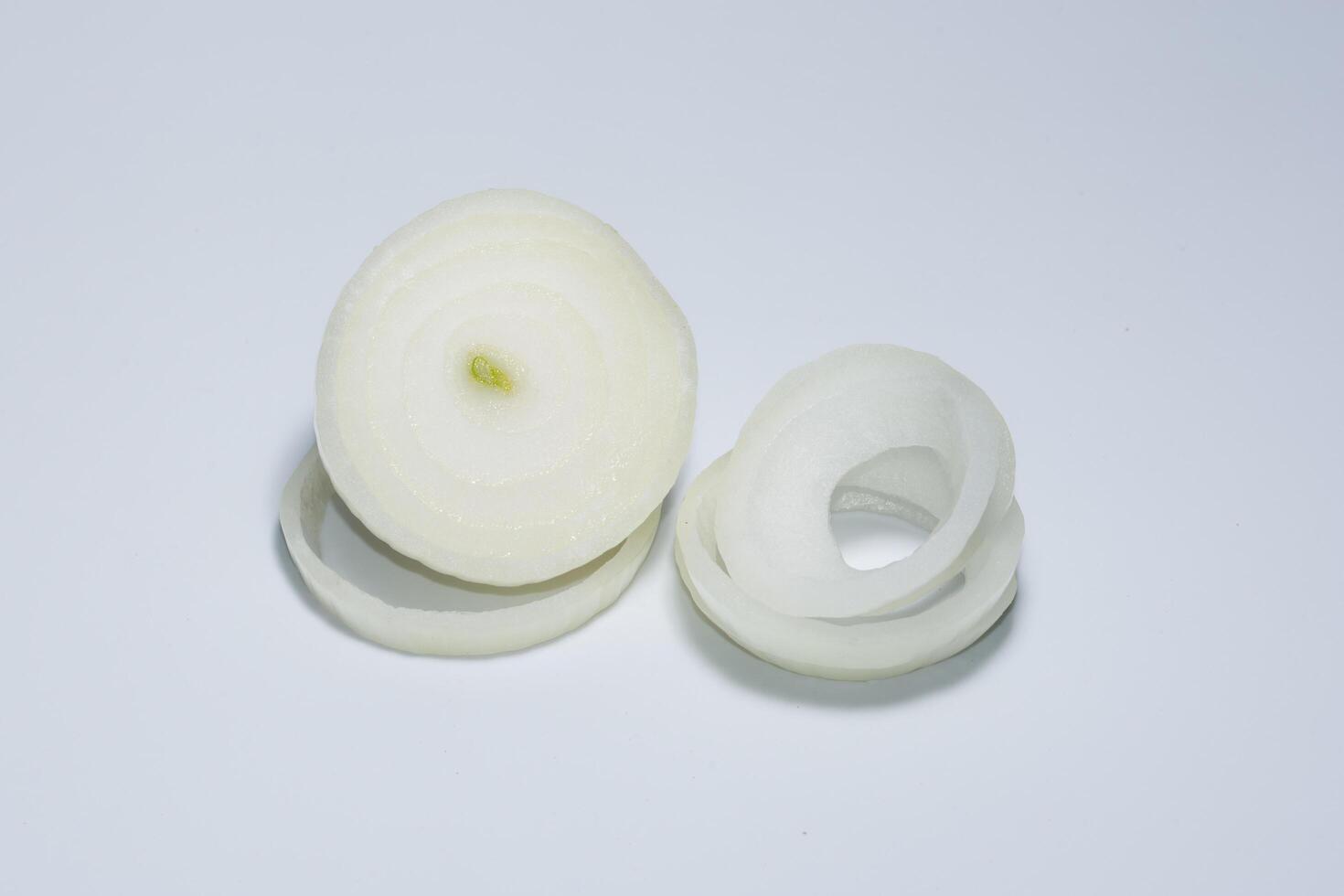 Onions on white background photo