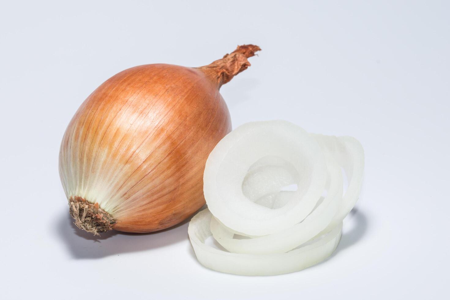 Onions on white background photo