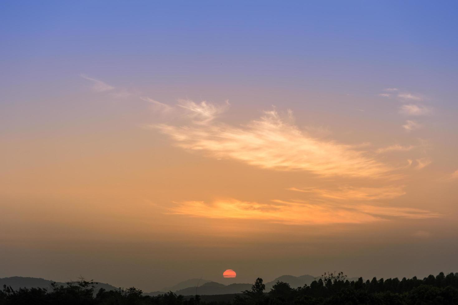 Clouds in the sky at sunrise photo