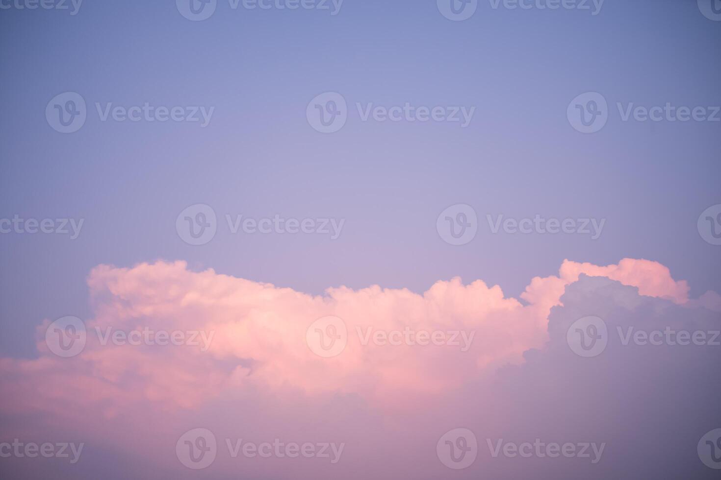 A pink cloud in the sky photo