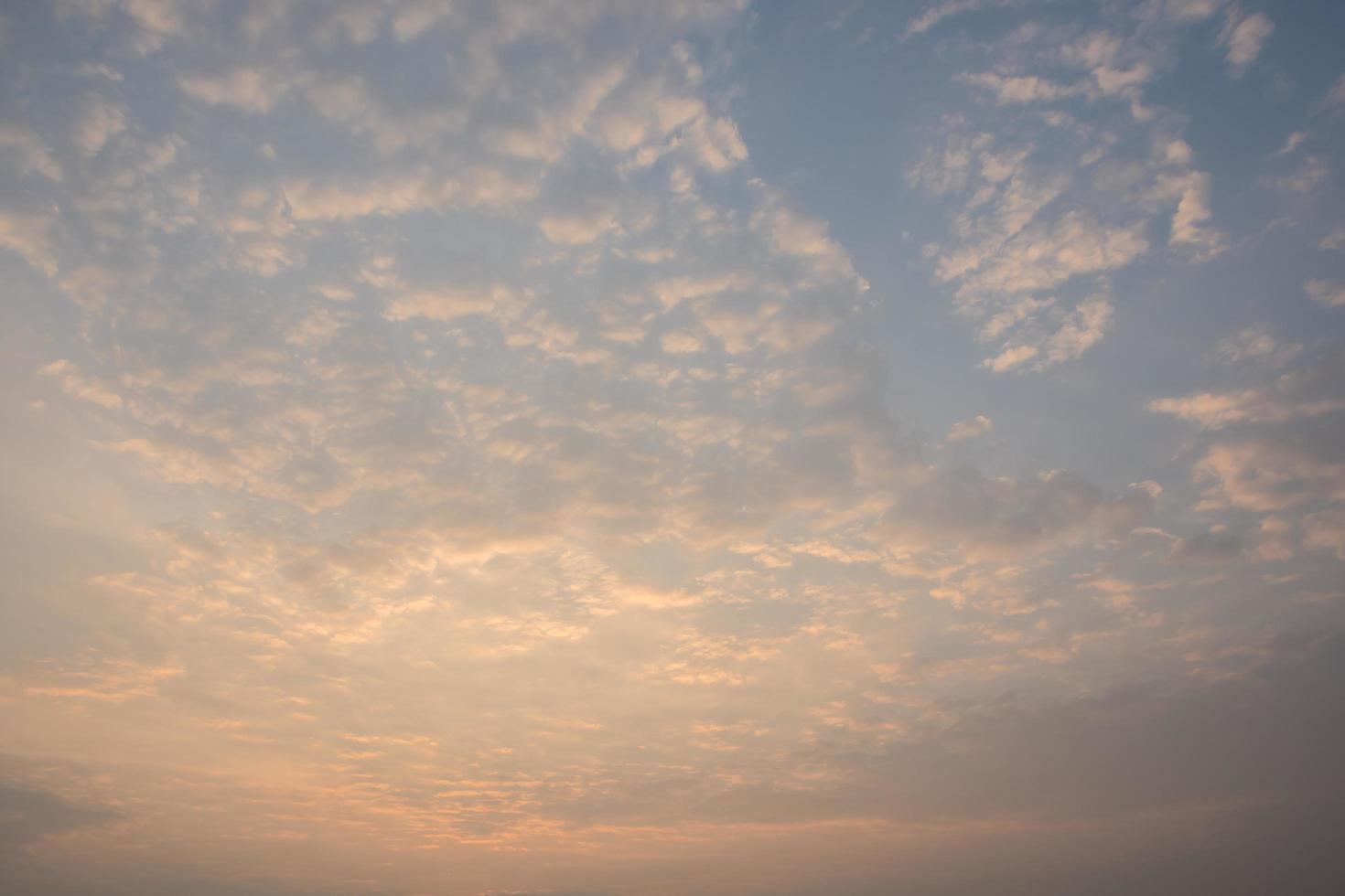 Clouds in the sky at sunrise photo