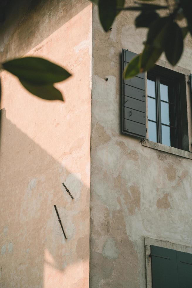 Beige wall on the side of a house photo