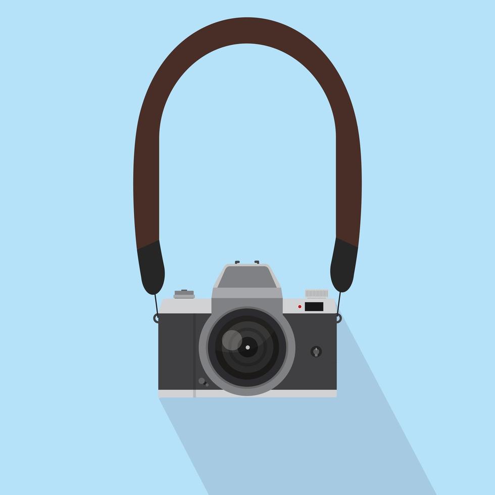 Vintage Camera in a flat style with strap vector