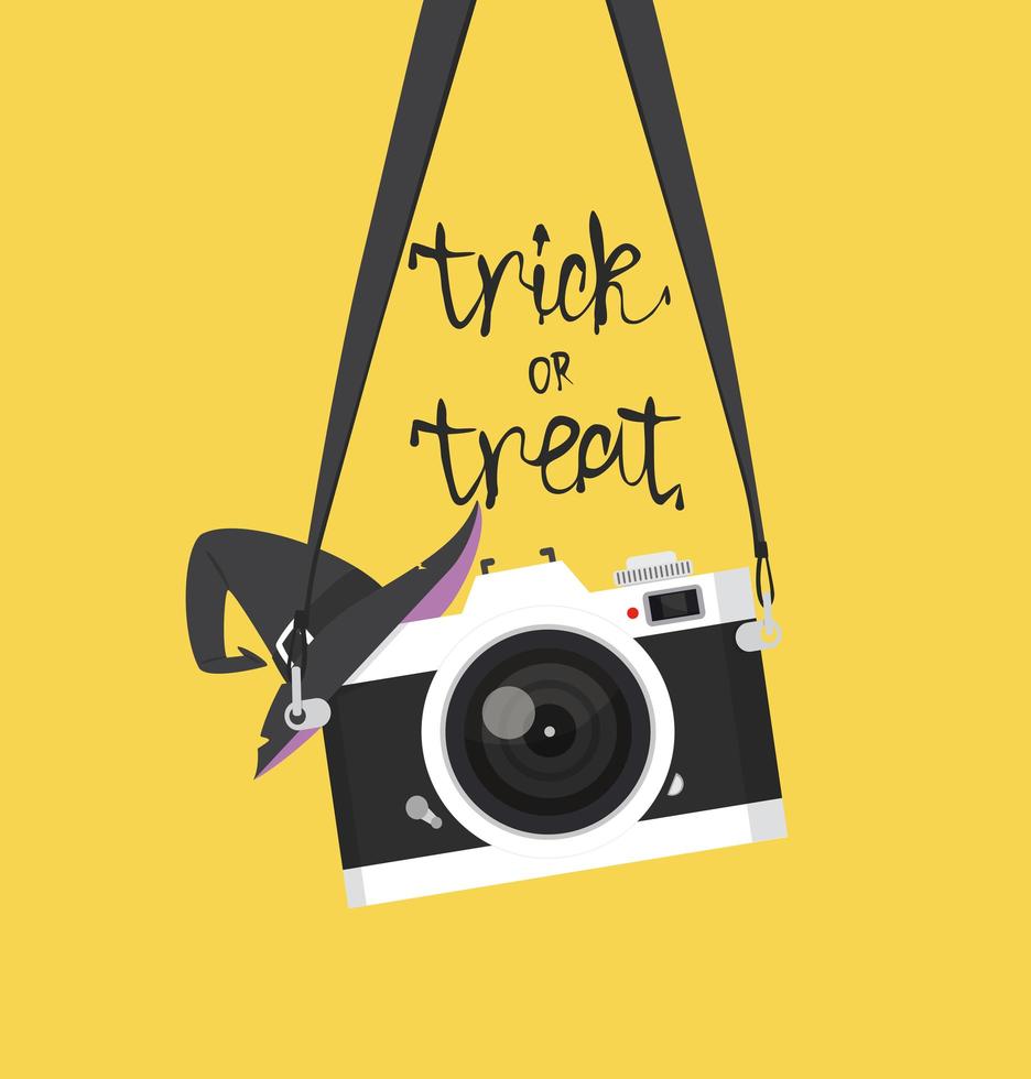 vintage camera hanging with witch hat for Halloween vector