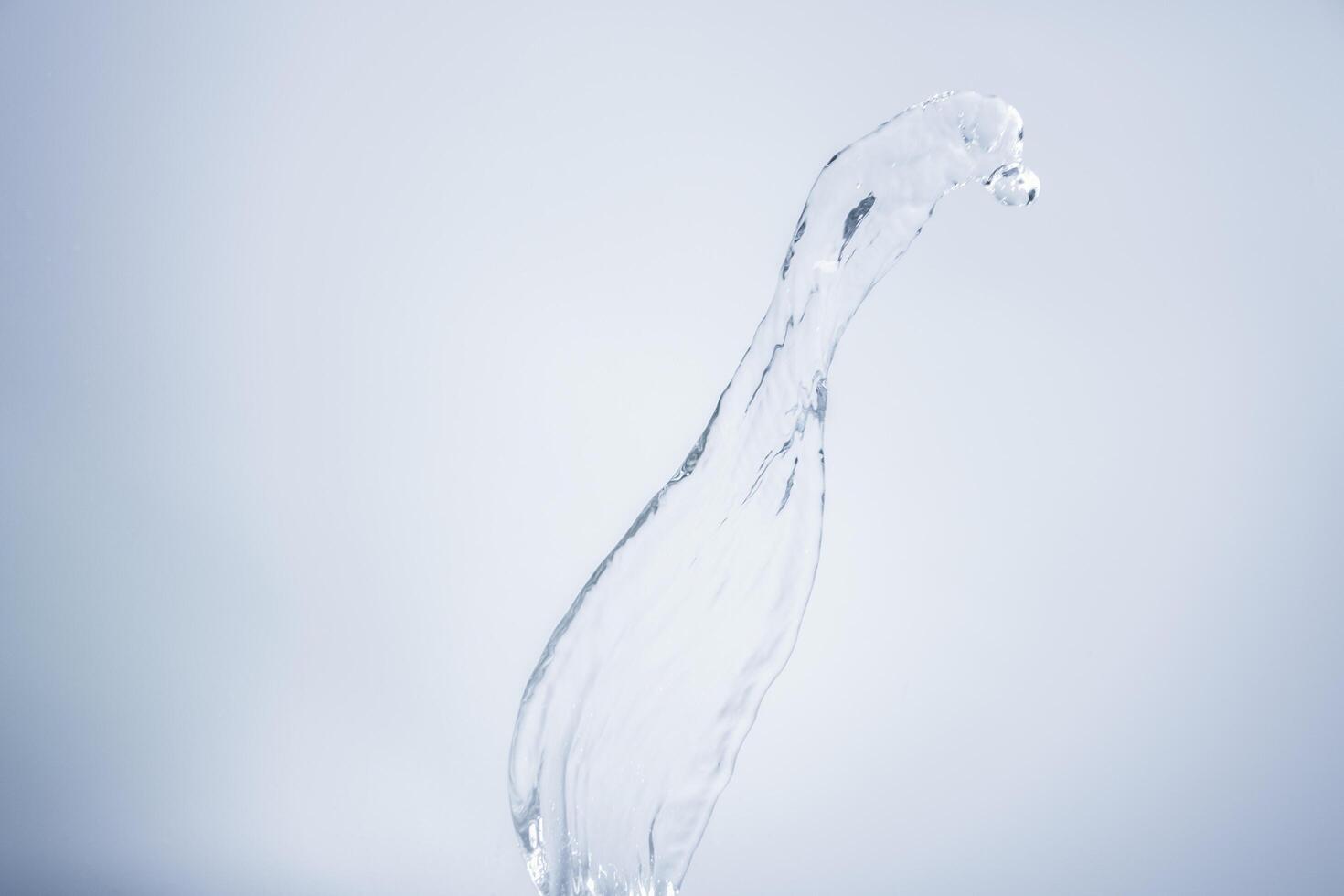 Water over white background photo