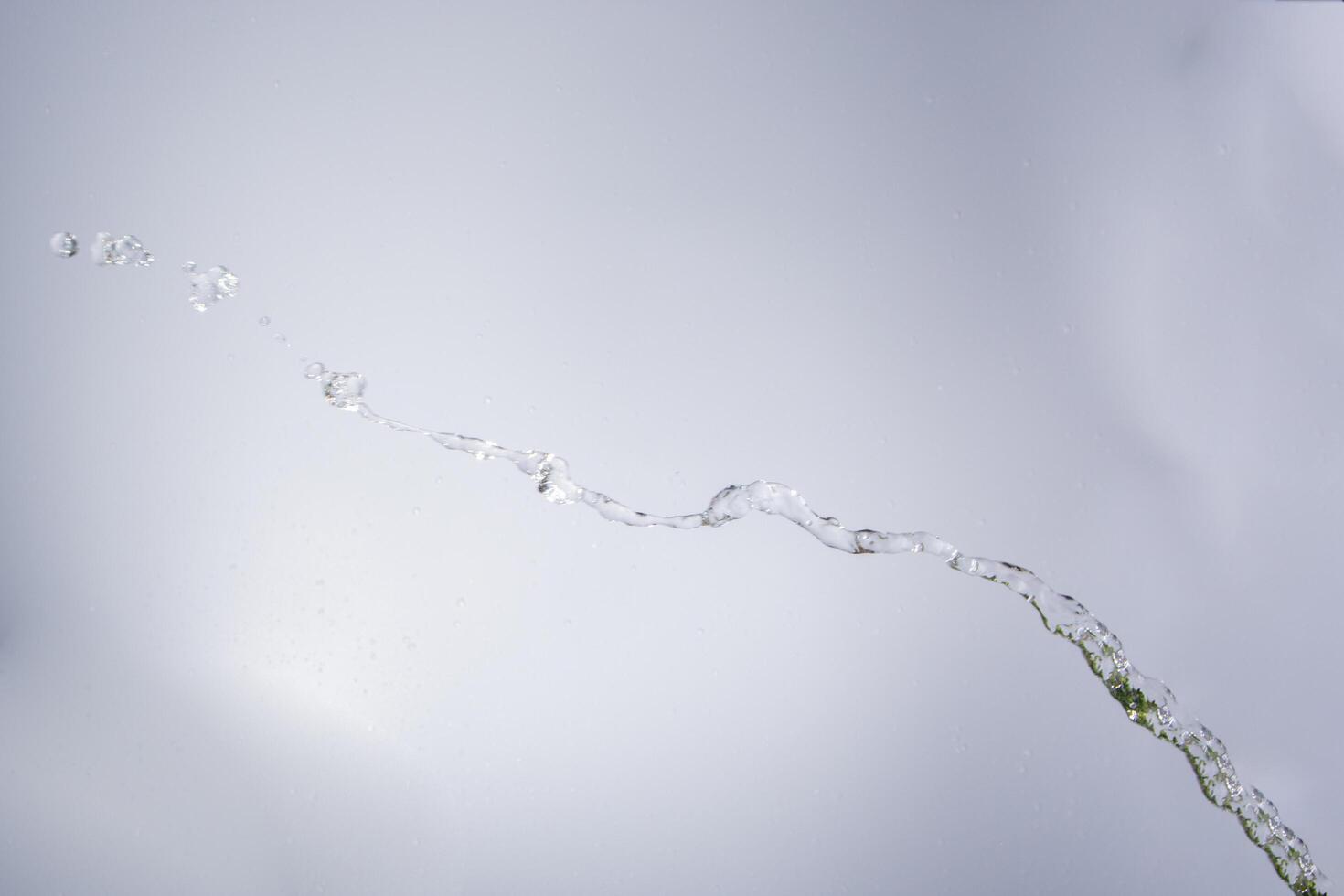 Splashing water from the glass photo