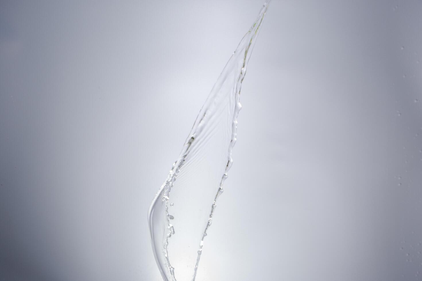 Water over grey background photo