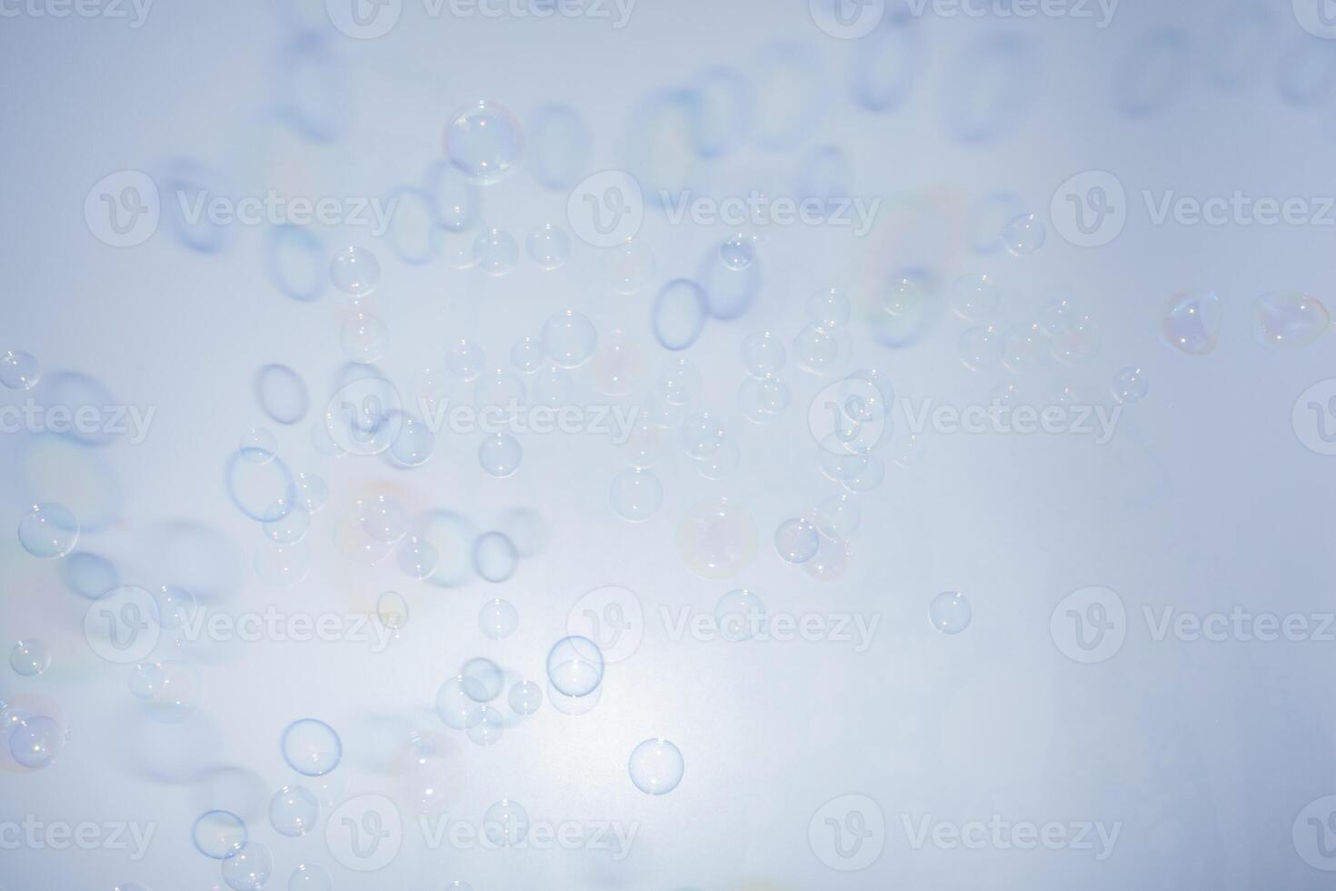 A blue background with bubbles and a blue sky photo