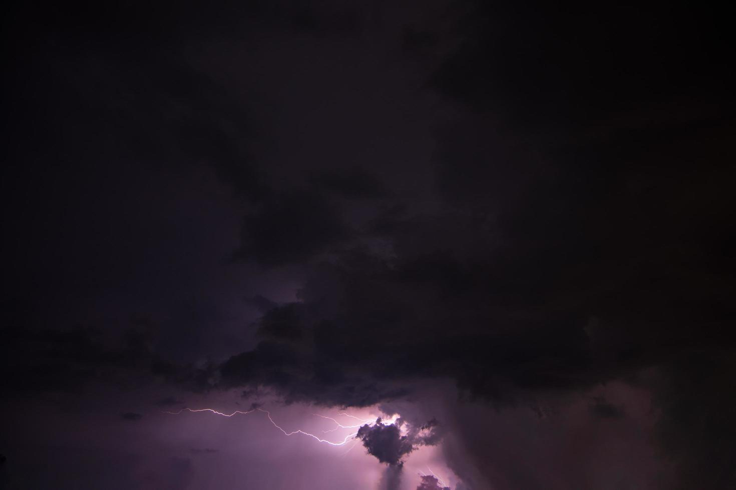 Lightning and dramatic stormy sky photo