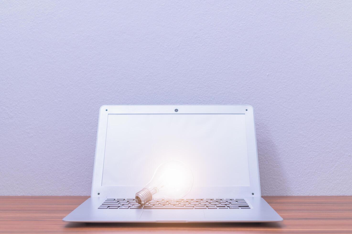 Laptop on the office desk photo