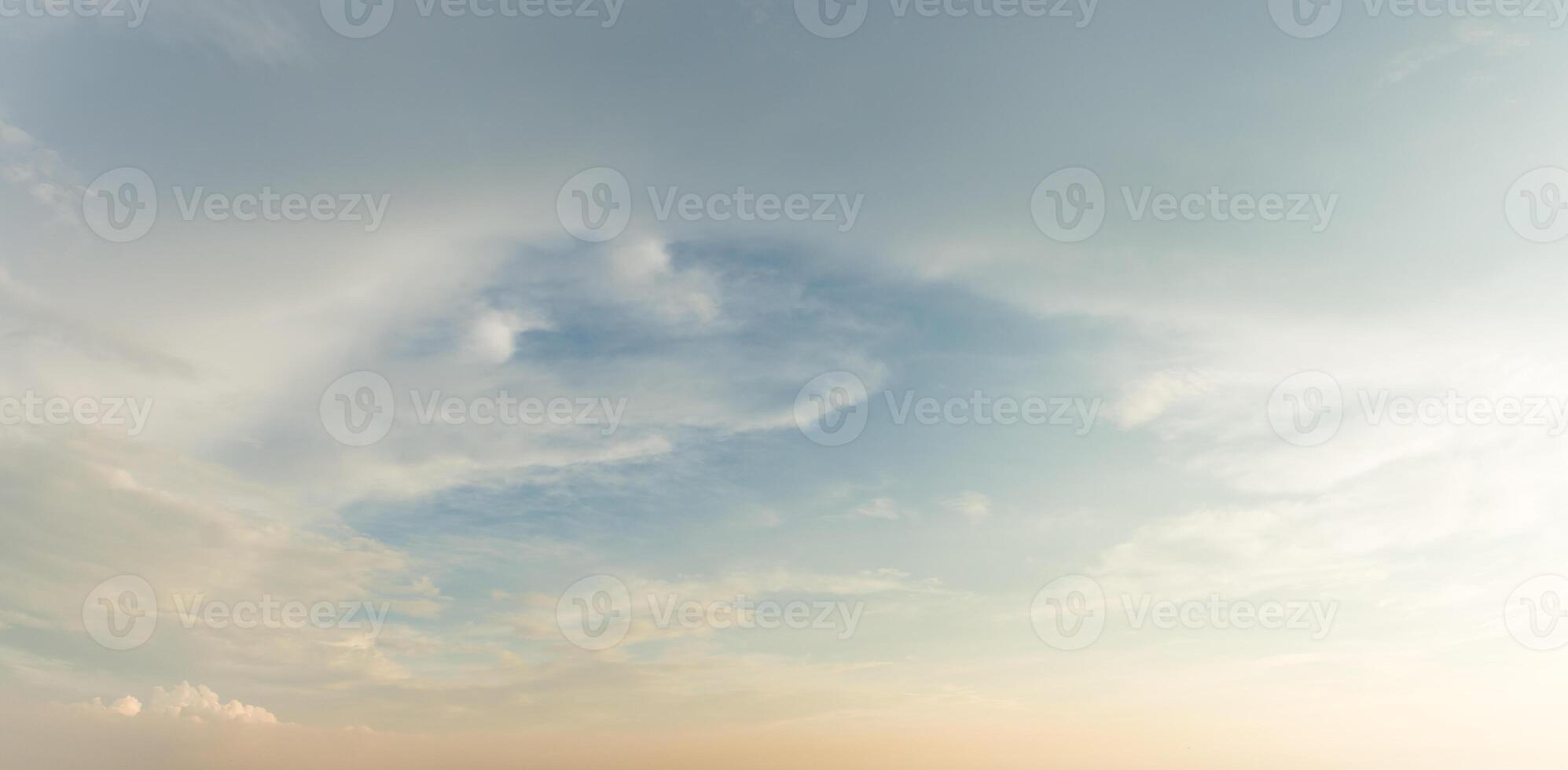 A man is standing on a beach with a surfboard photo