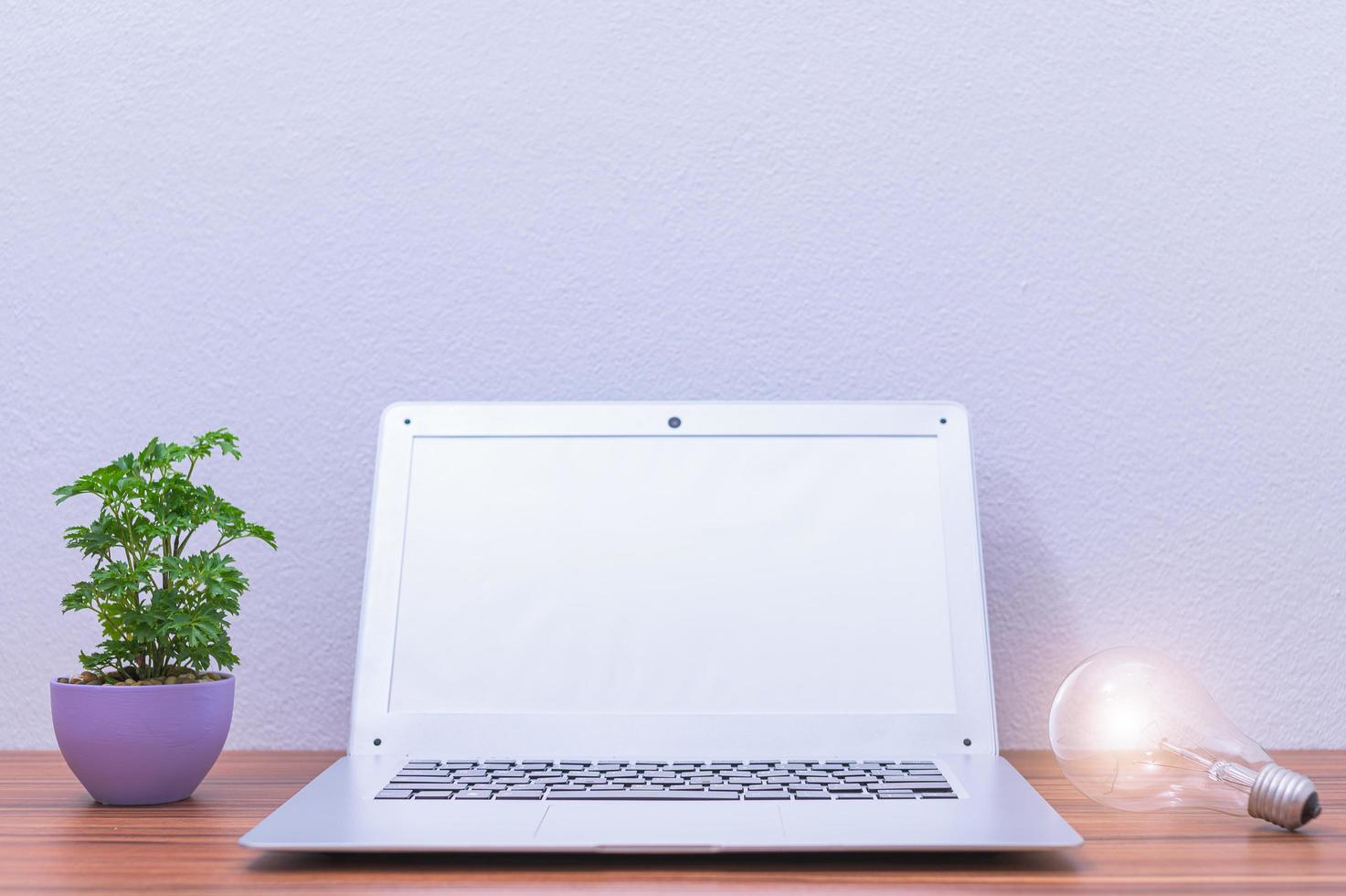 Laptop on the office desk photo