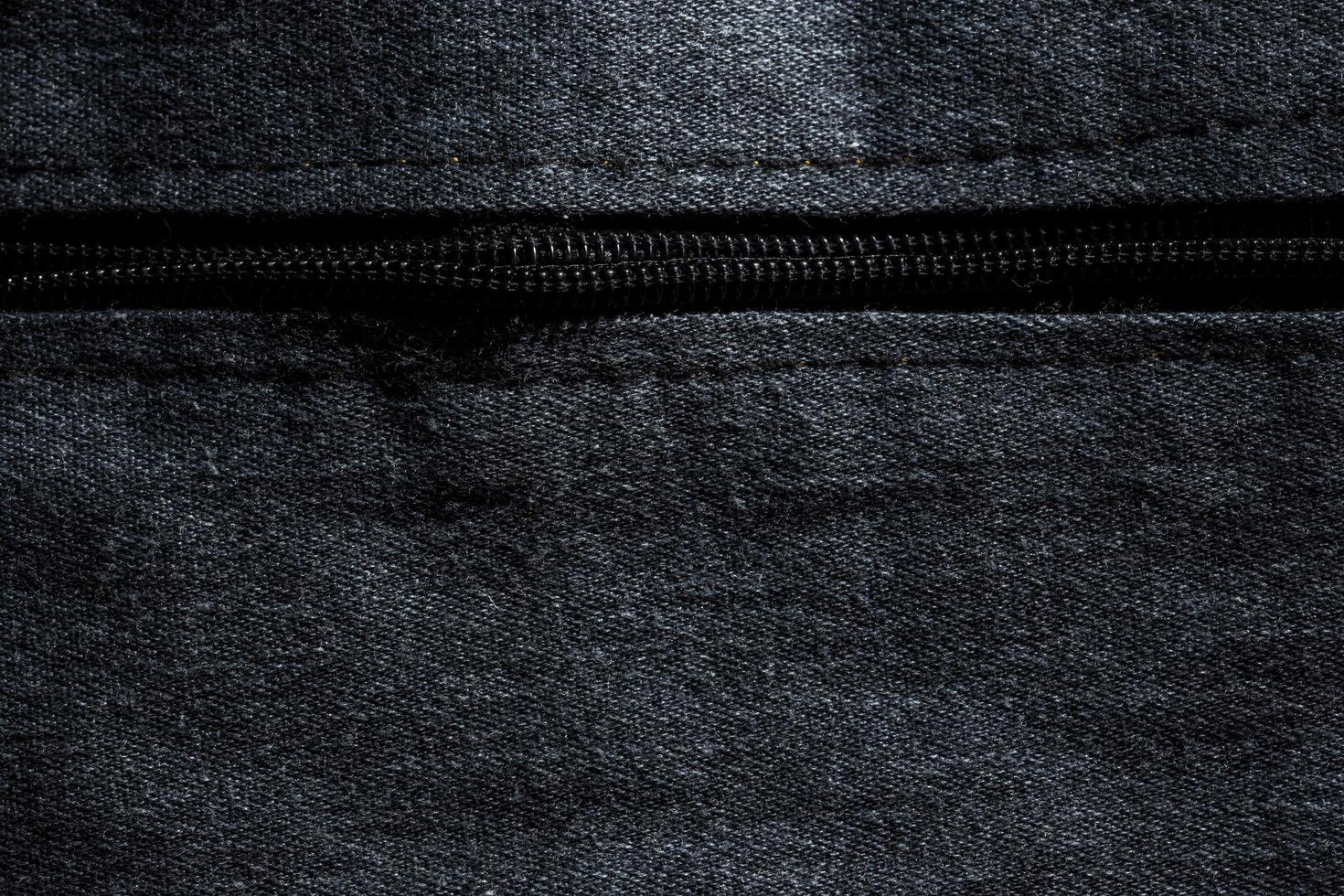 fondo de mezclilla de algodón oscuro foto