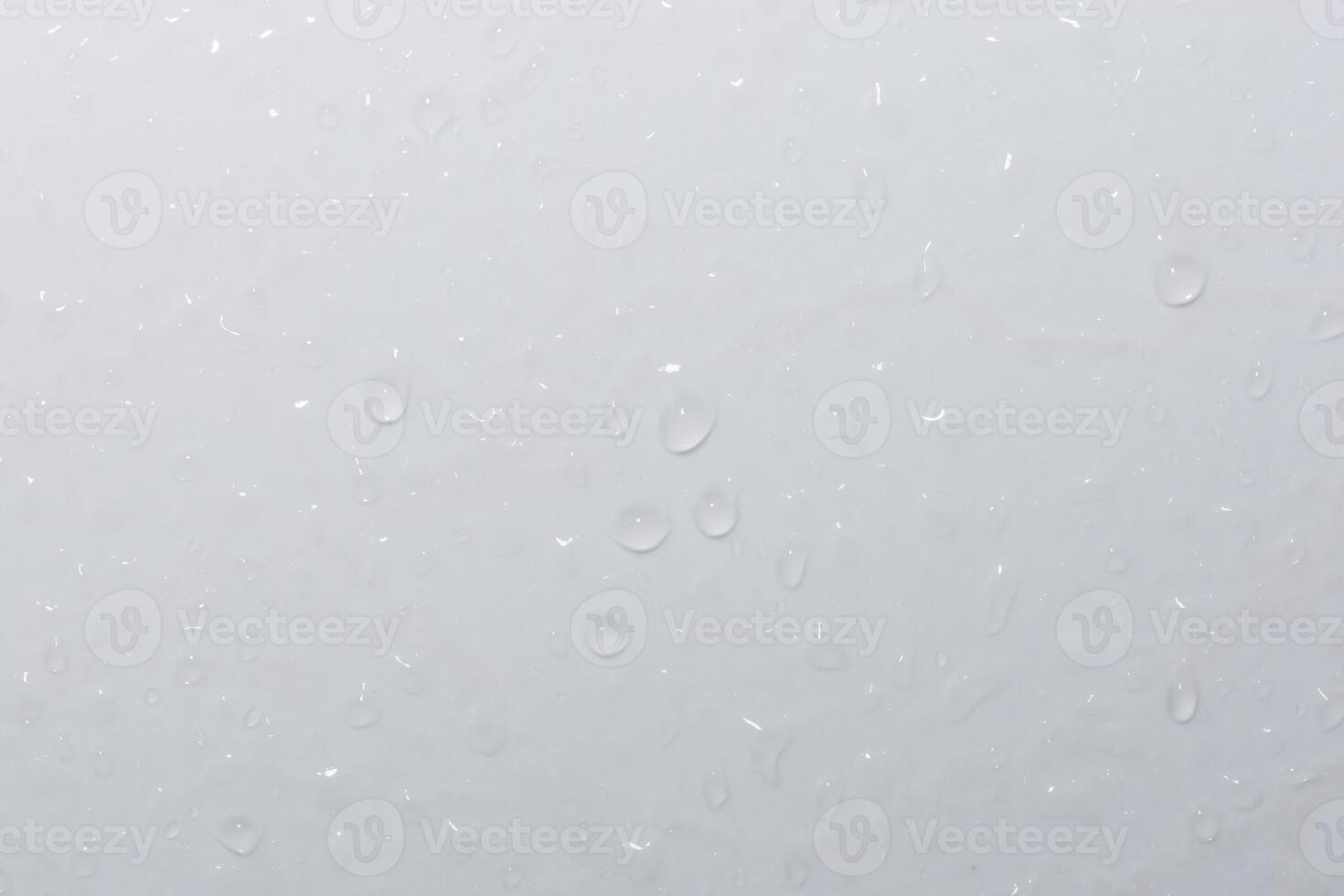 Rain drops on the window glass photo