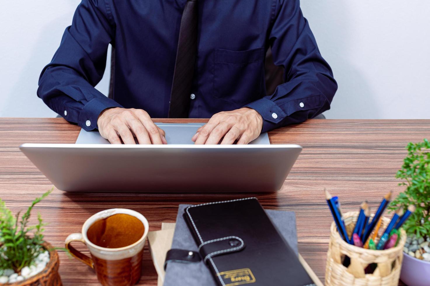 Businessman working at his desk photo