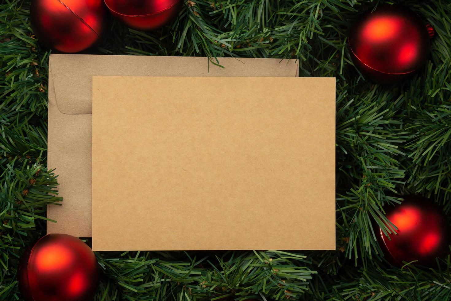 Merry Christmas greeting card and envelope mockup template photo